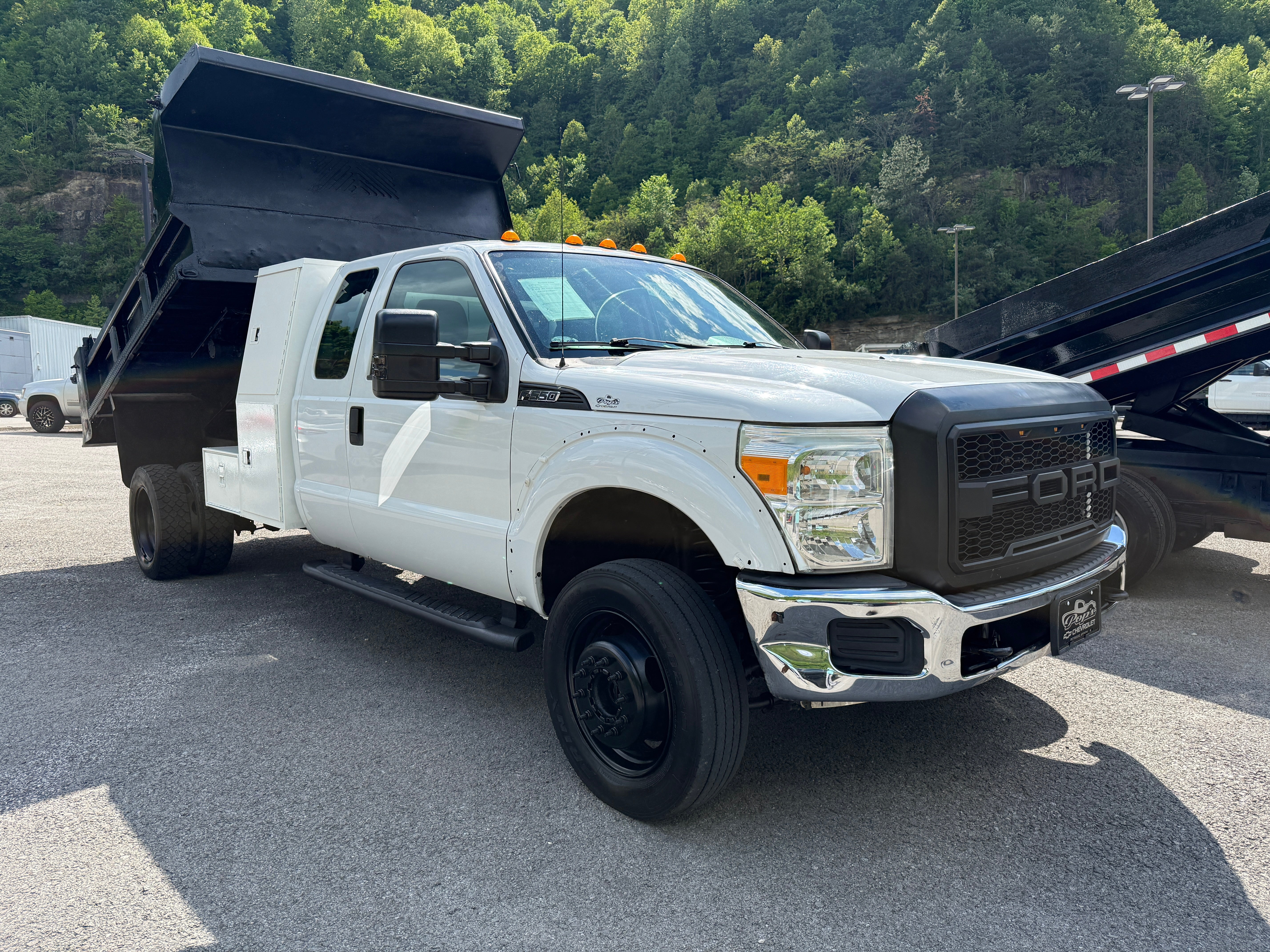 2013 Ford Super Duty F-550 DRW XL in White — front three-quarter view