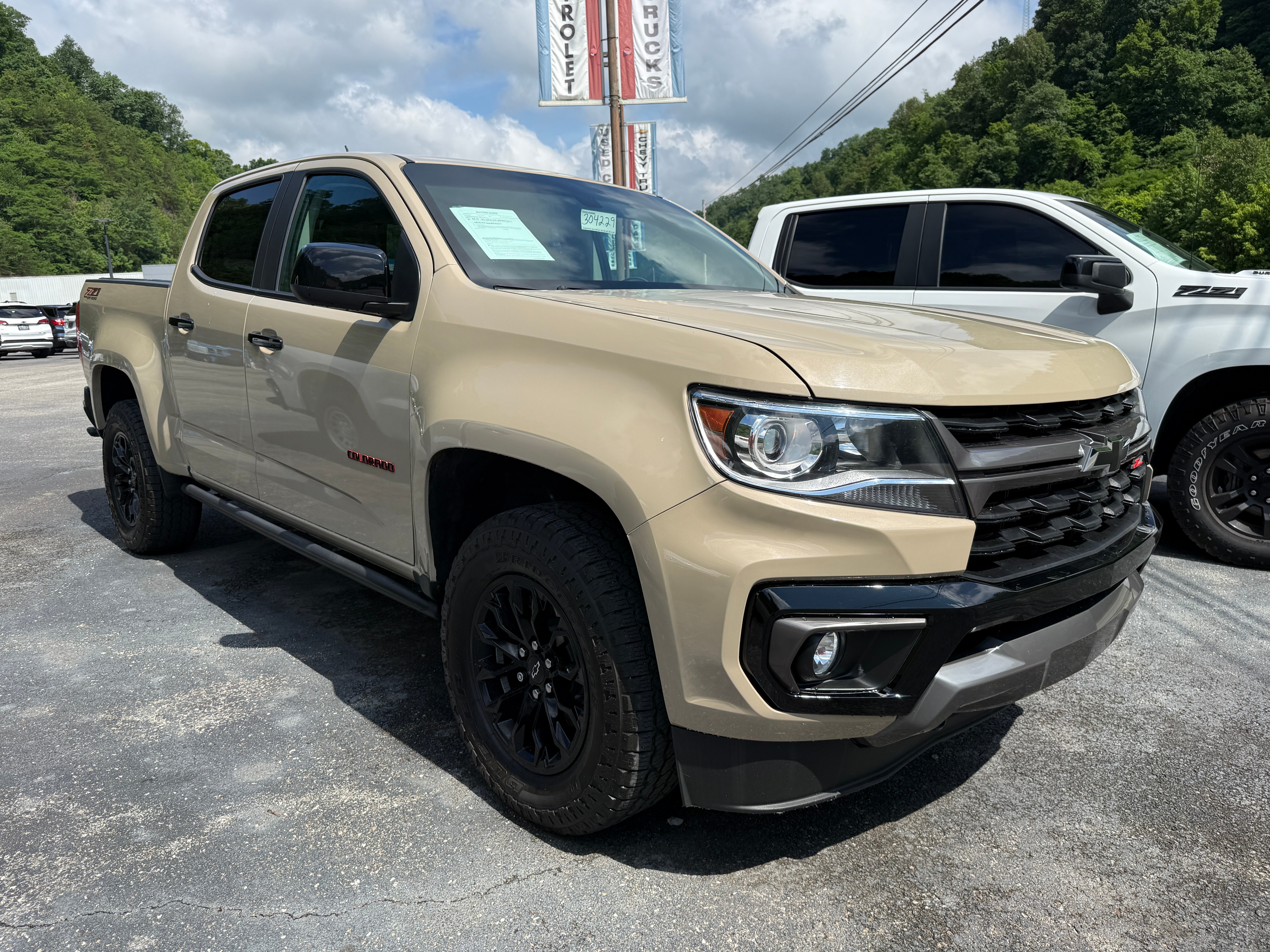 2022 Chevrolet Colorado Z71 in Sand Dune Metallic — front three-quarter view