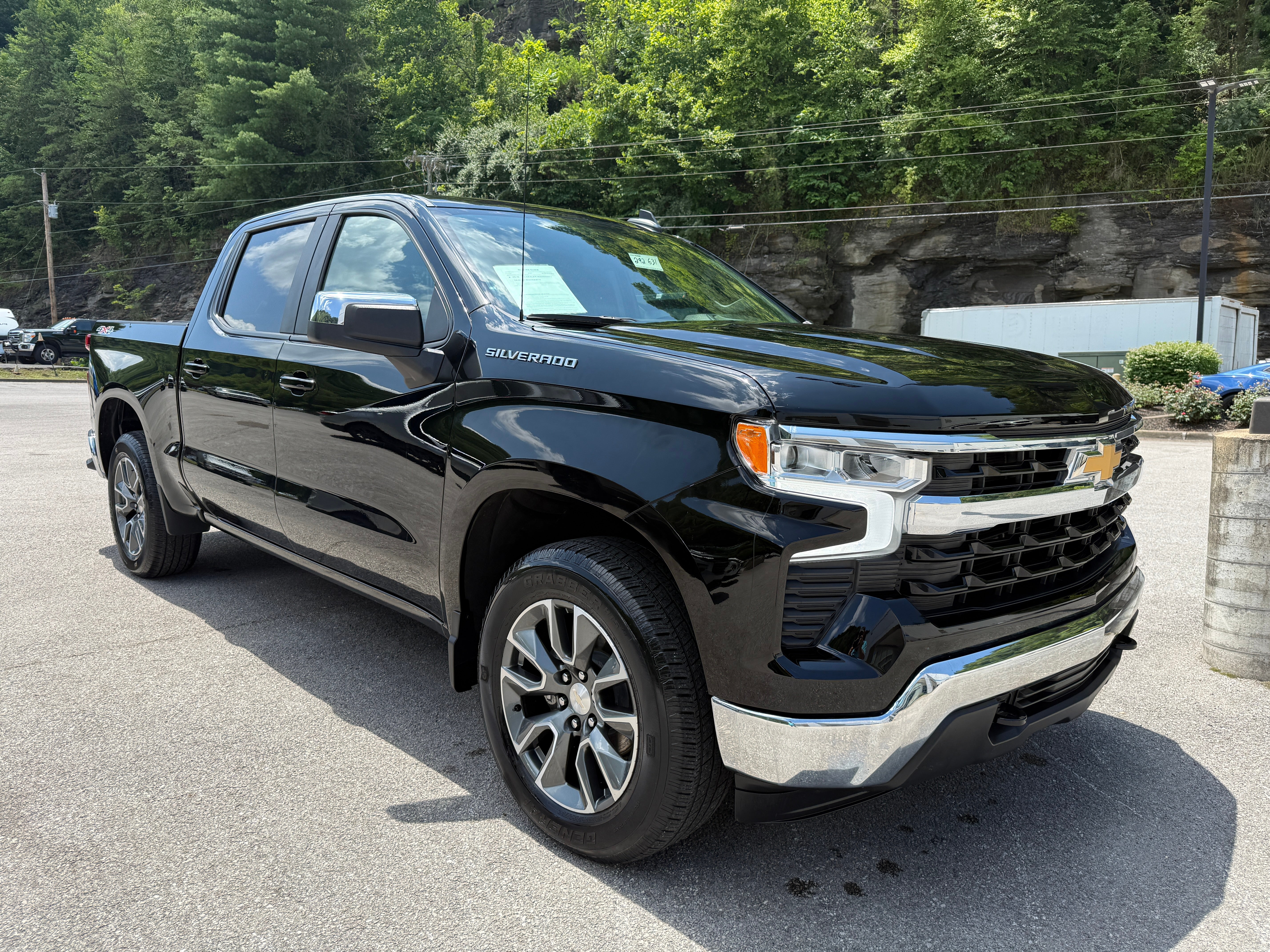 2023 Chevrolet Silverado 1500 LT (2FL) in Black — front three-quarter view