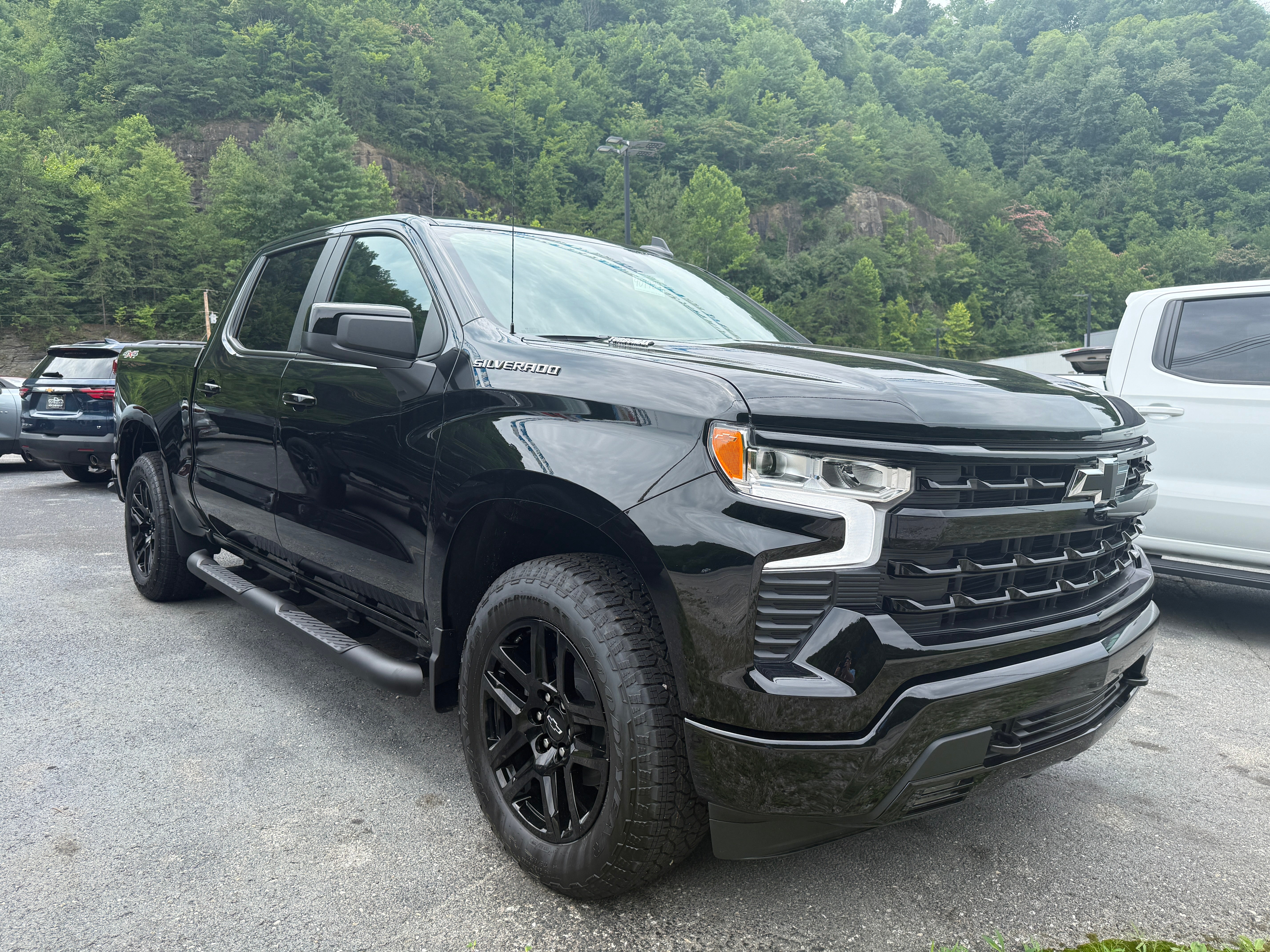 2026 Chevrolet Silverado 1500 RST in Black — front three-quarter view