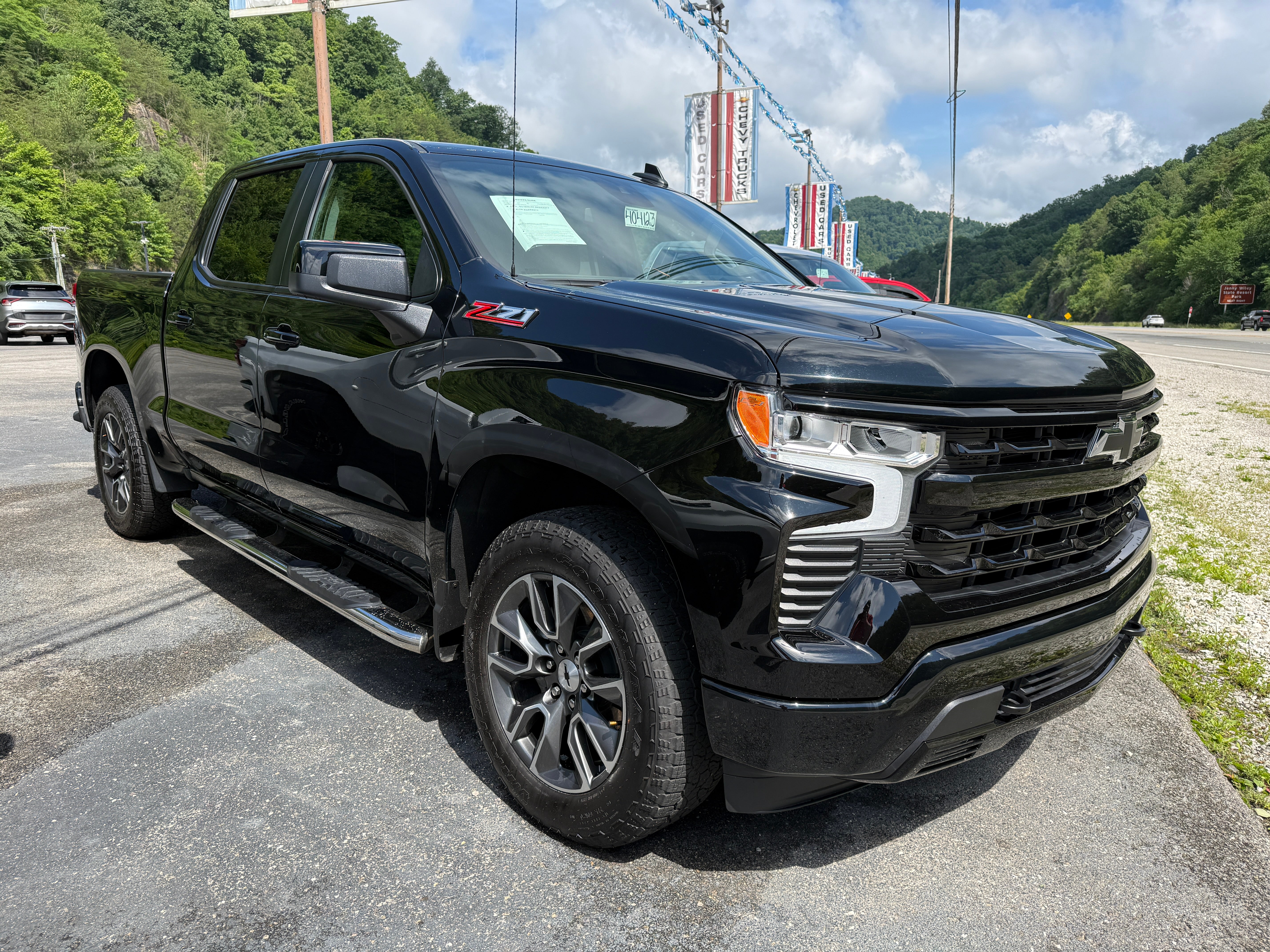 2024 Chevrolet Silverado 1500 RST in Black — front three-quarter view