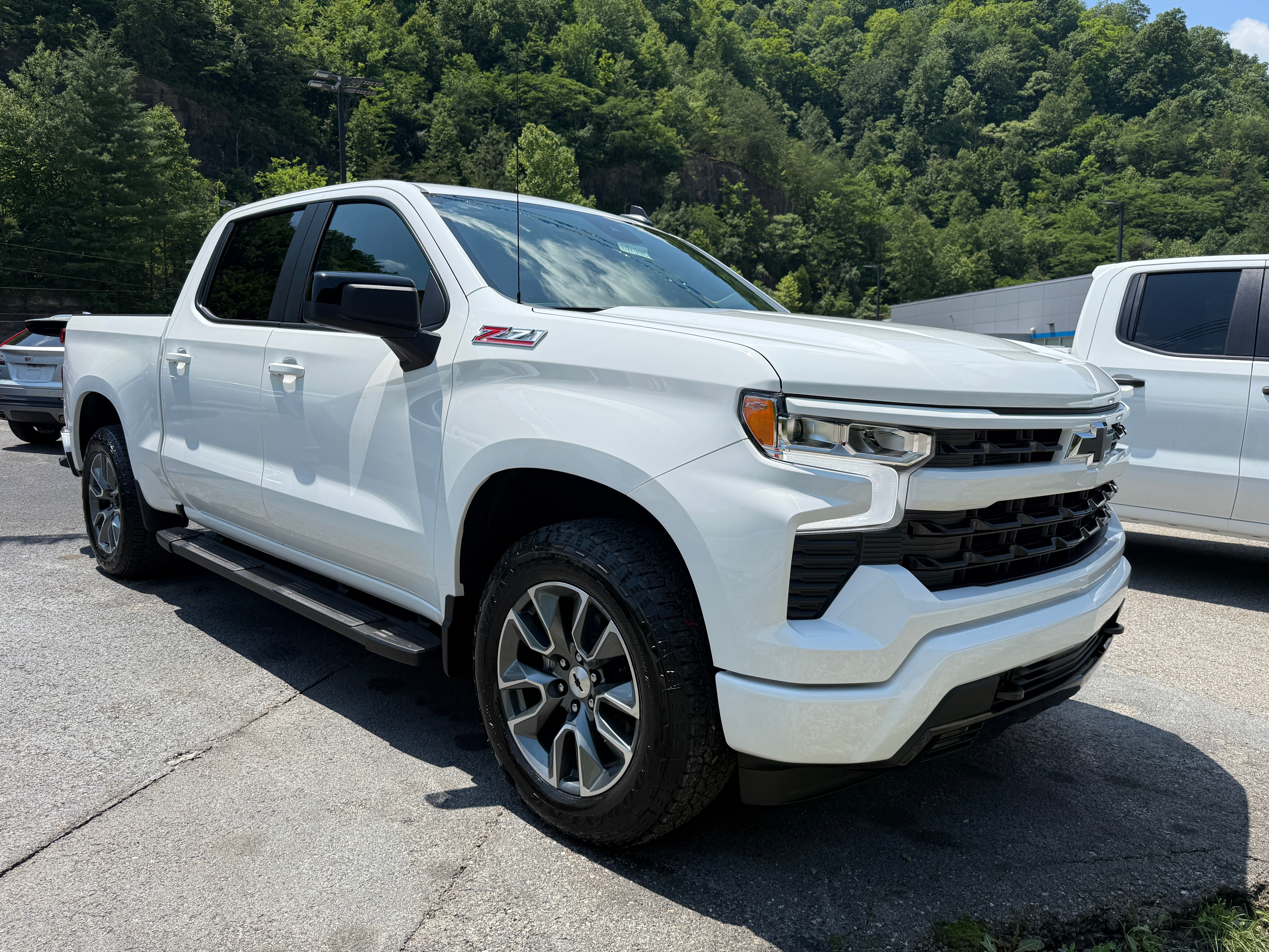 2026 Chevrolet Silverado 1500 RST in Summit White — front three-quarter view