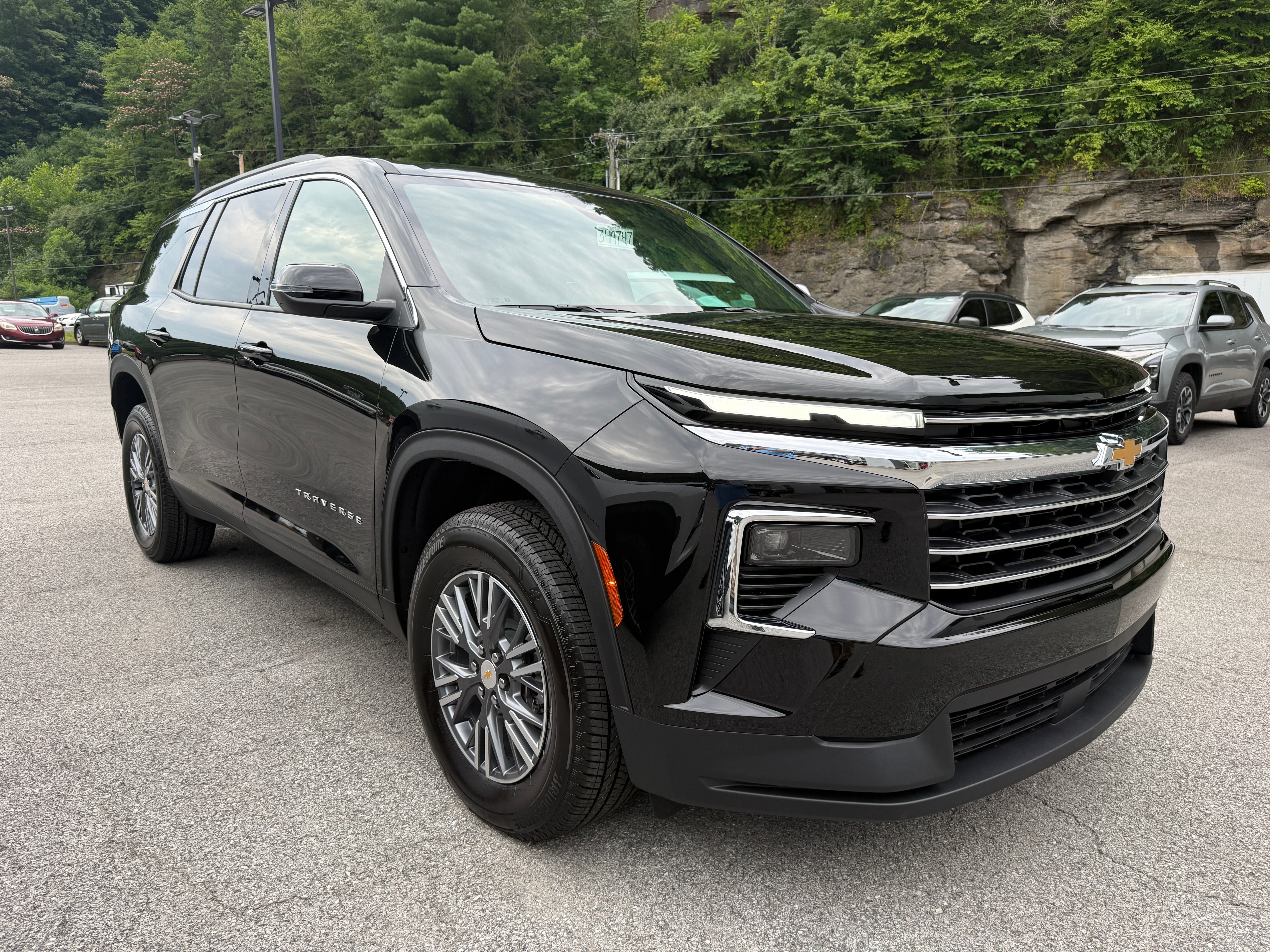 2026 Chevrolet Traverse LT in Mosaic Black Metallic — front three-quarter view