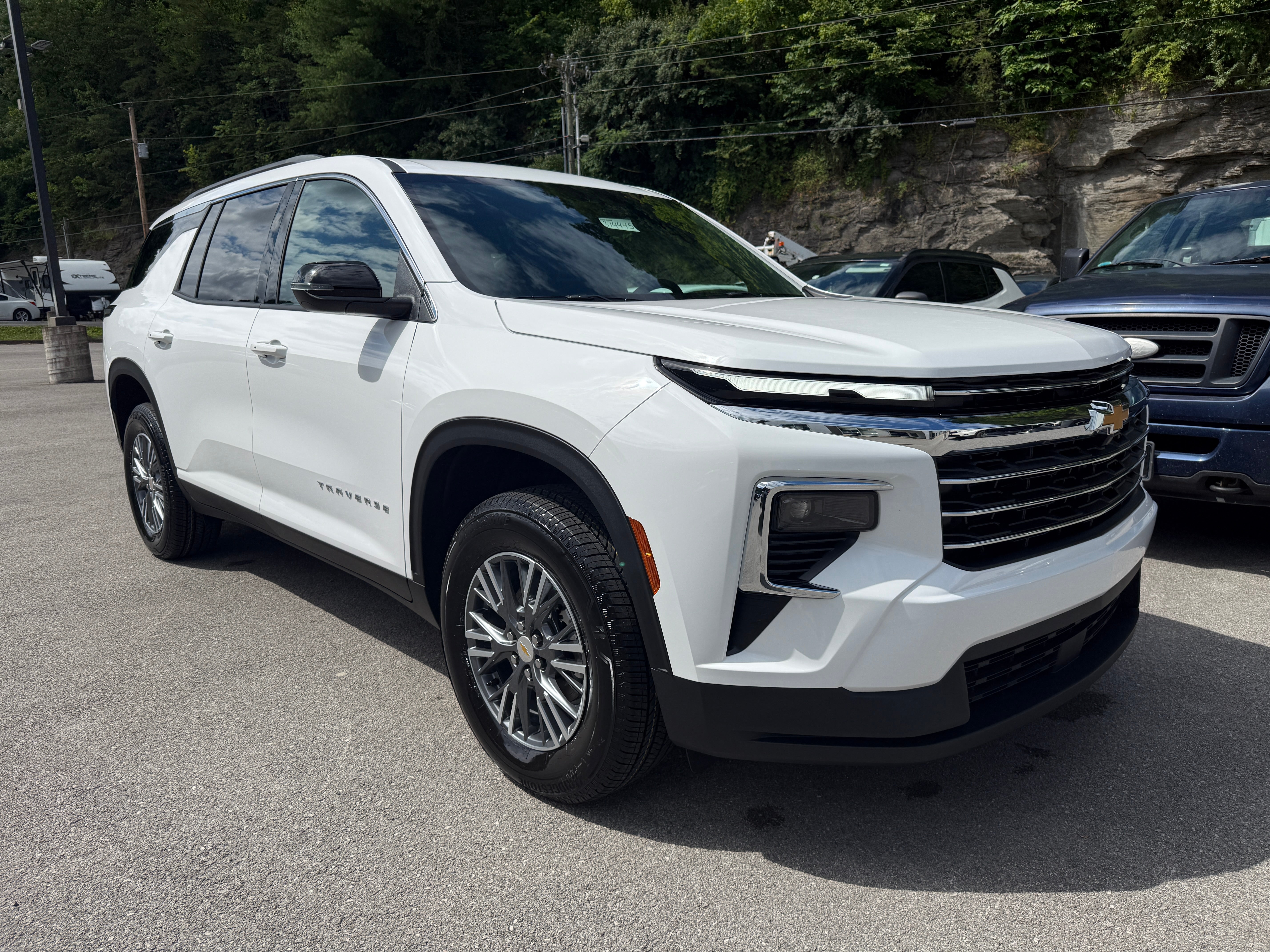 2026 Chevrolet Traverse LT in Summit White — front three-quarter view