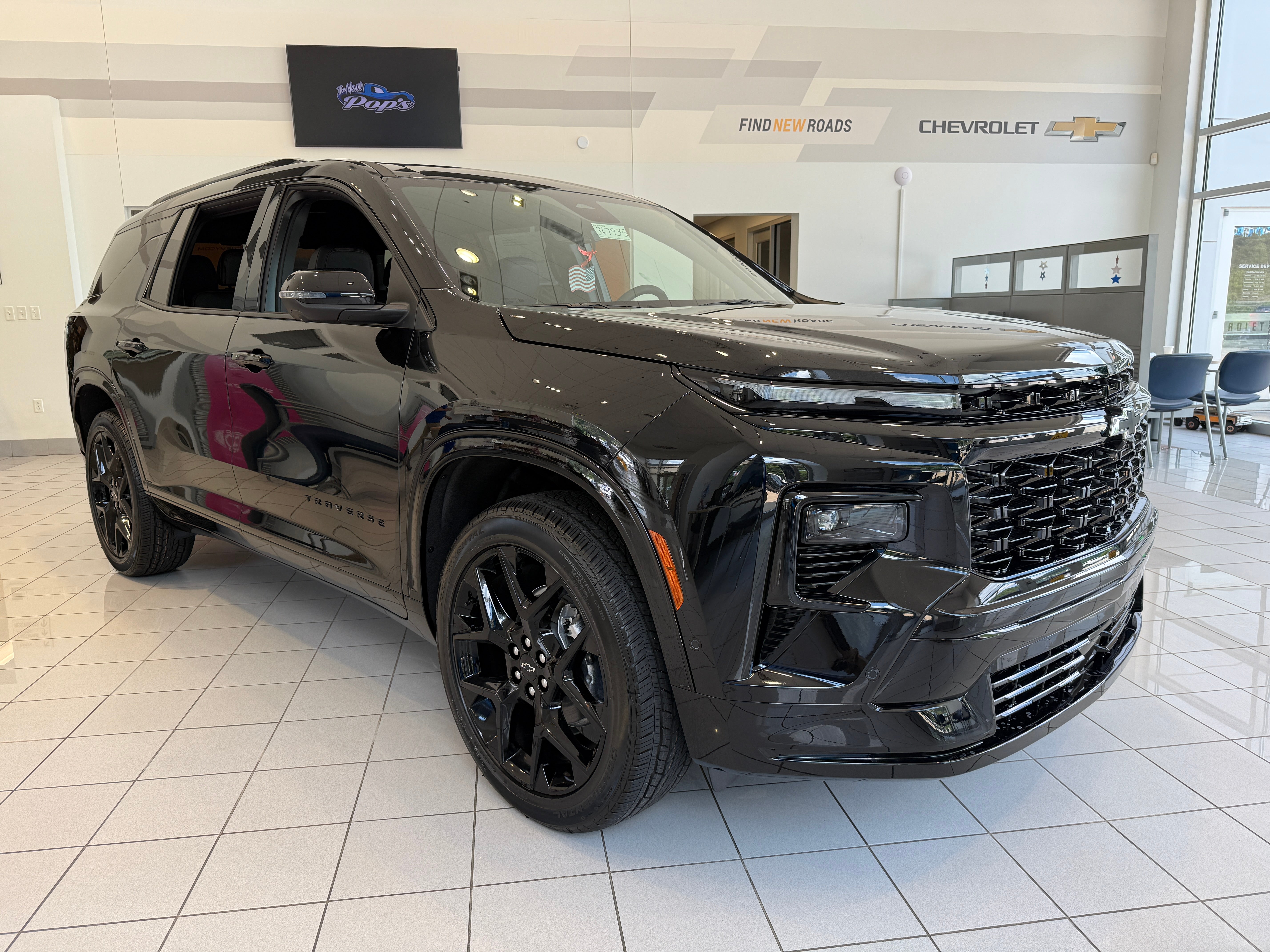 2026 Chevrolet Traverse RS in Mosaic Black Metallic — front three-quarter view