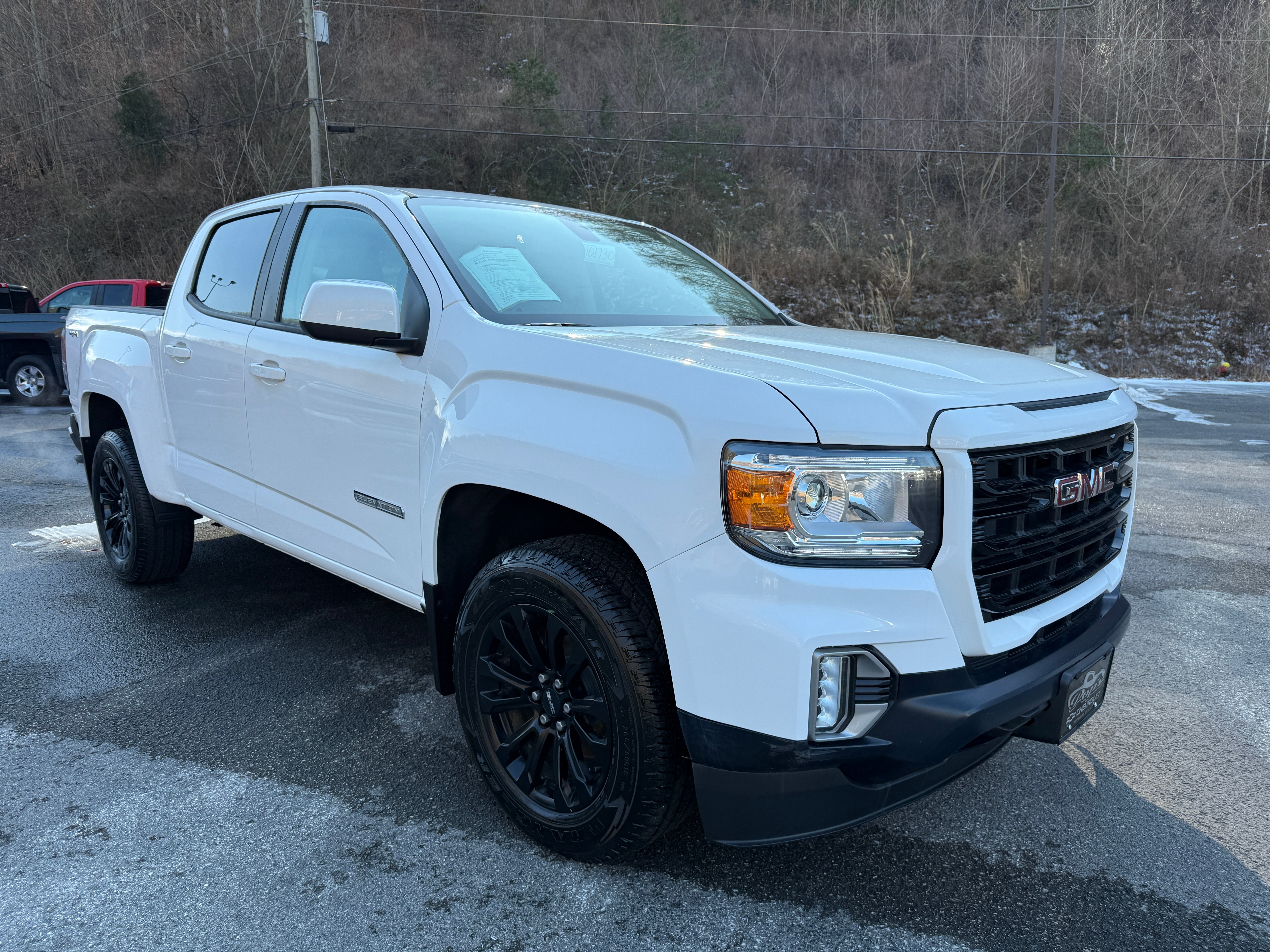 2021 GMC Canyon Elevation in Summit White — front three-quarter view
