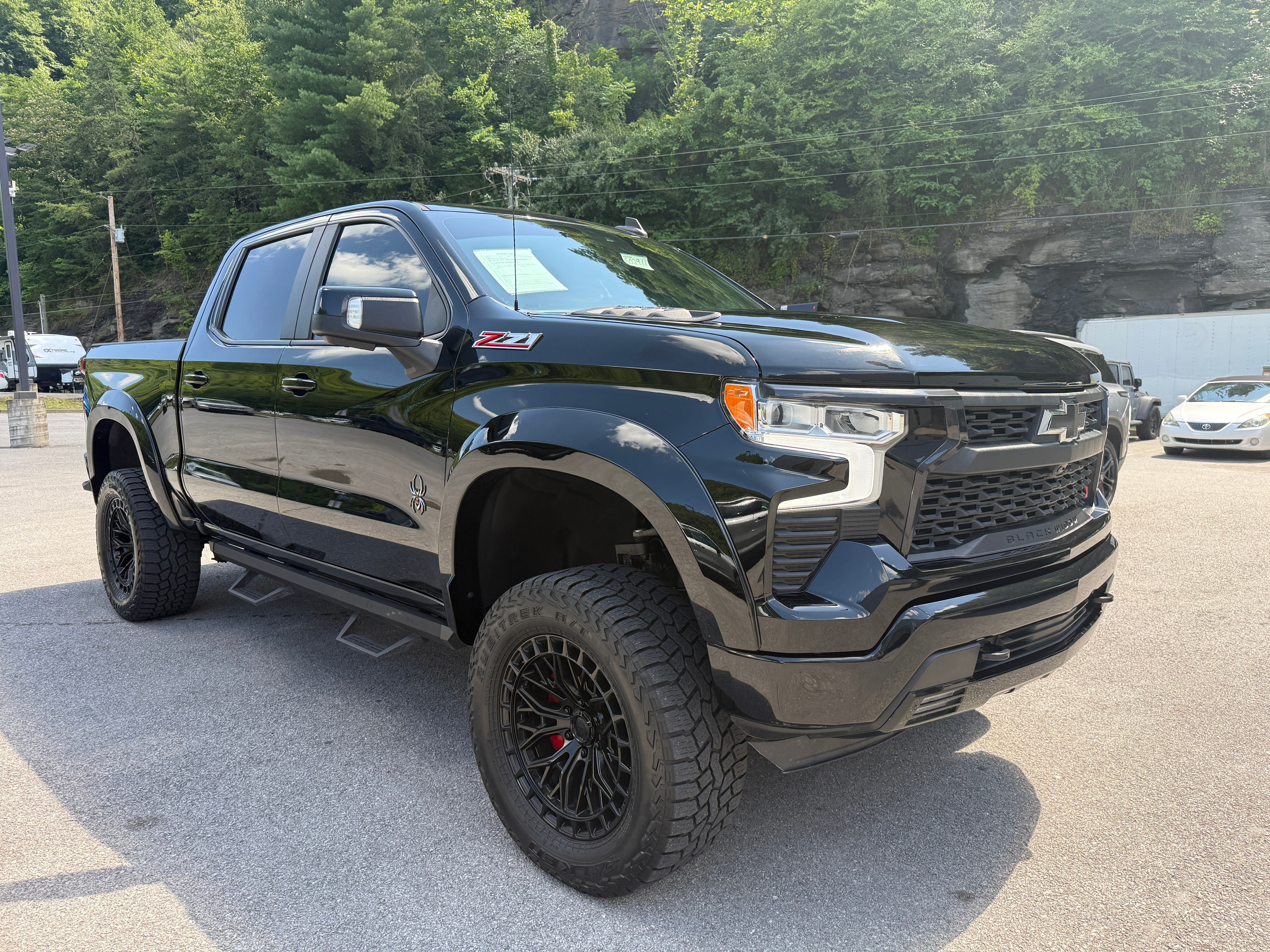 2022 Chevrolet Silverado 1500 RST in Black — front three-quarter view