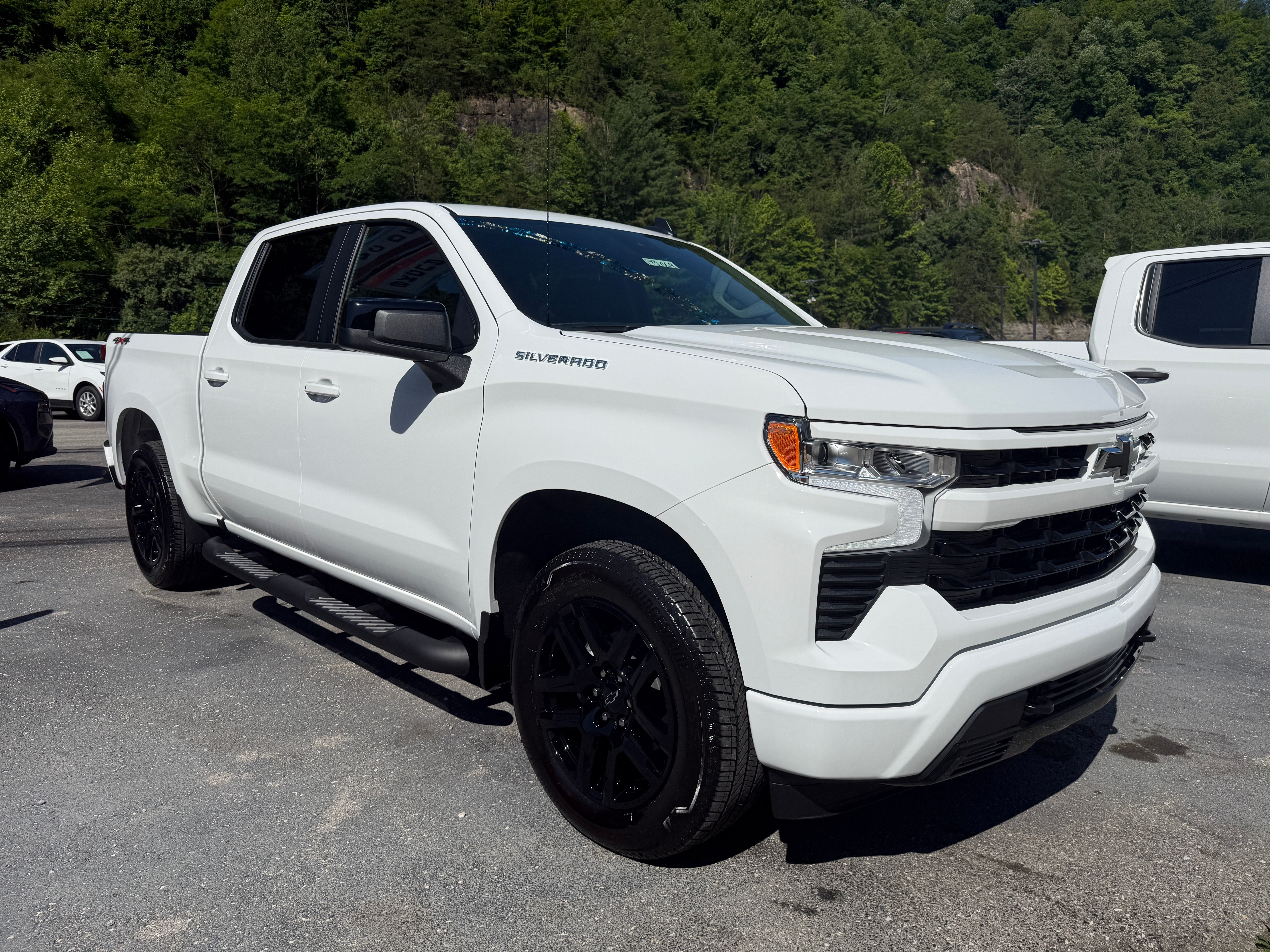 2026 Chevrolet Silverado 1500 RST in Summit White — front three-quarter view