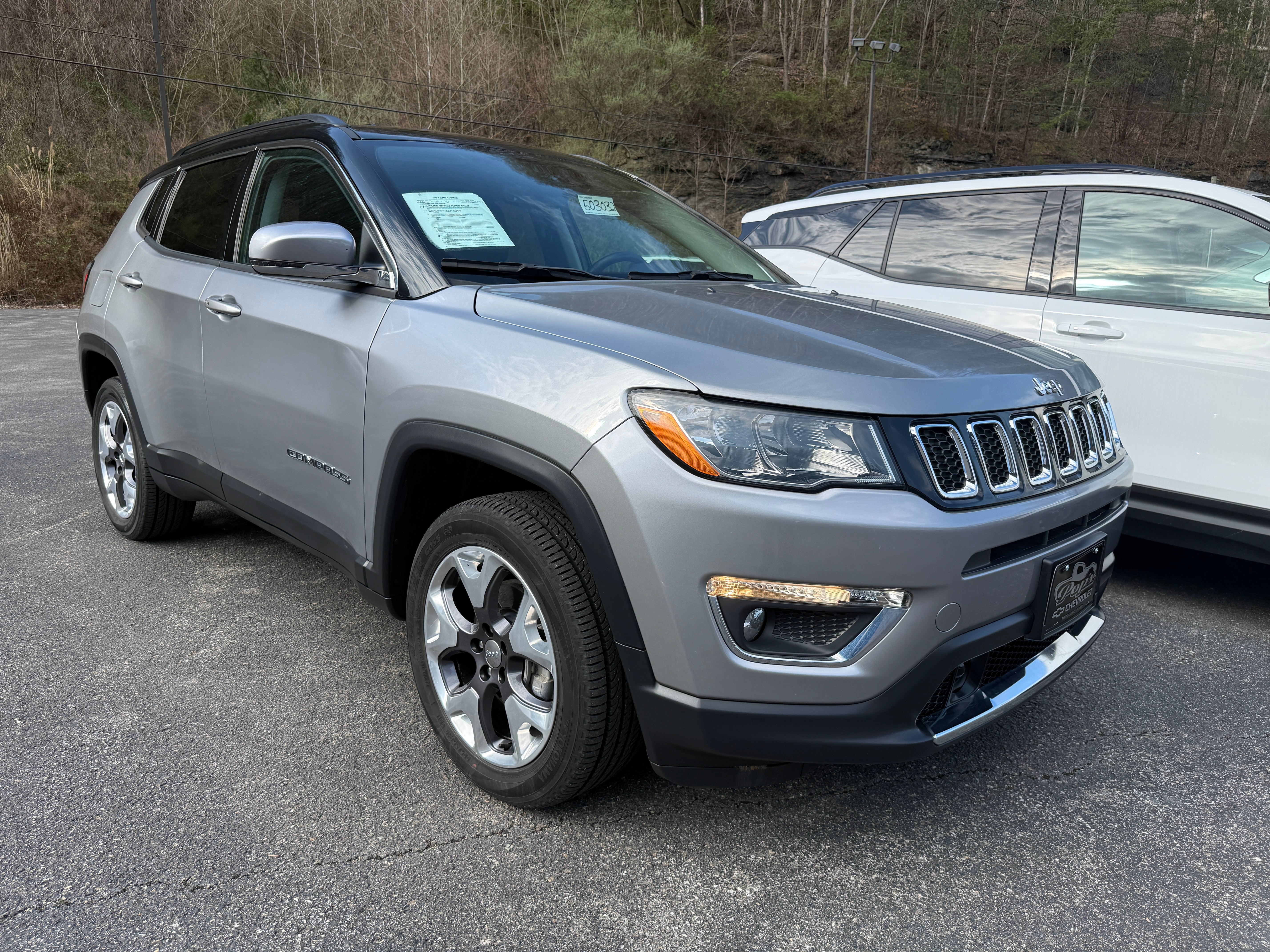 2021 Jeep Compass Limited in Silver — front three-quarter view