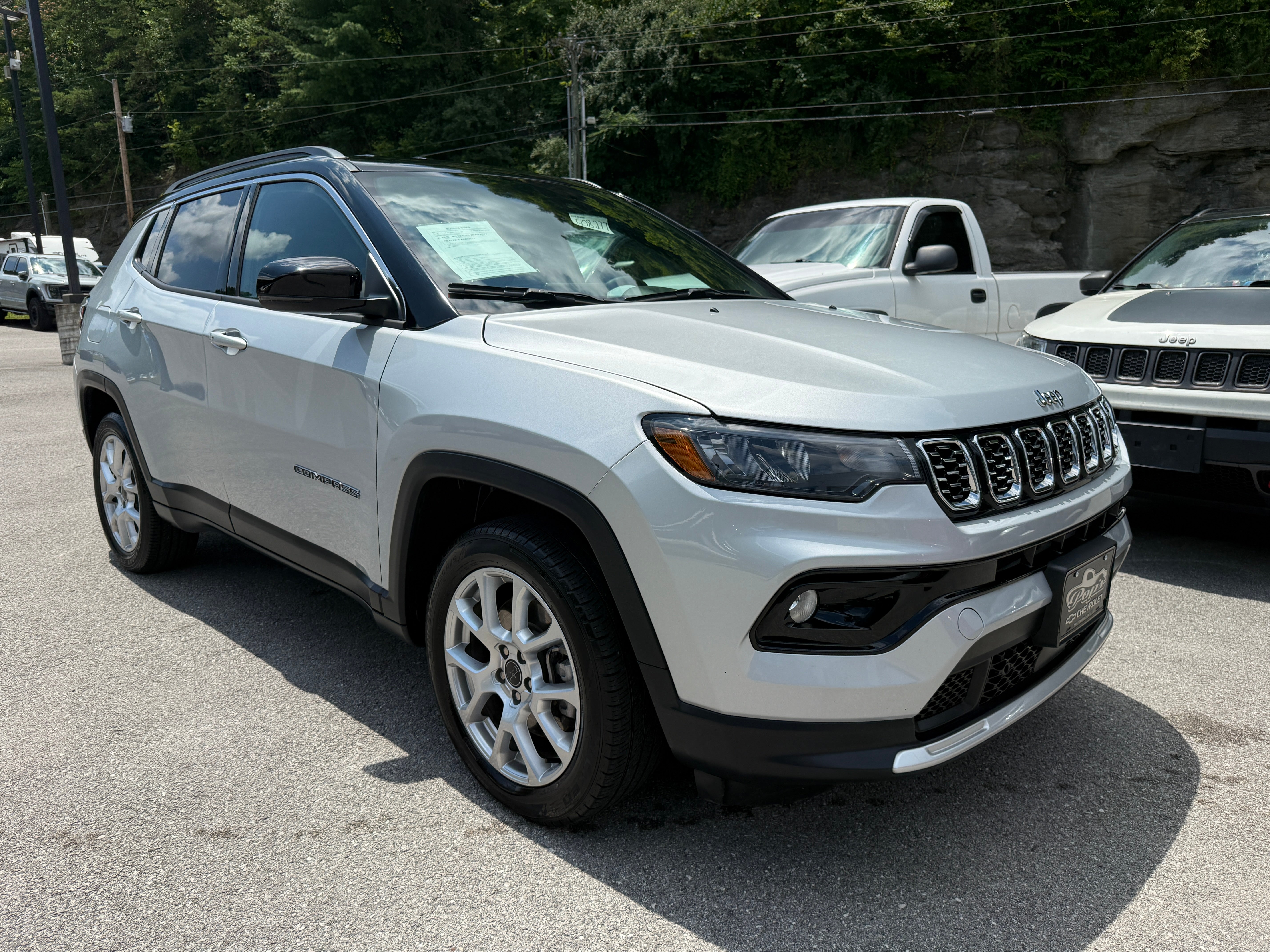 2025 Jeep Compass Limited in Silver — front three-quarter view