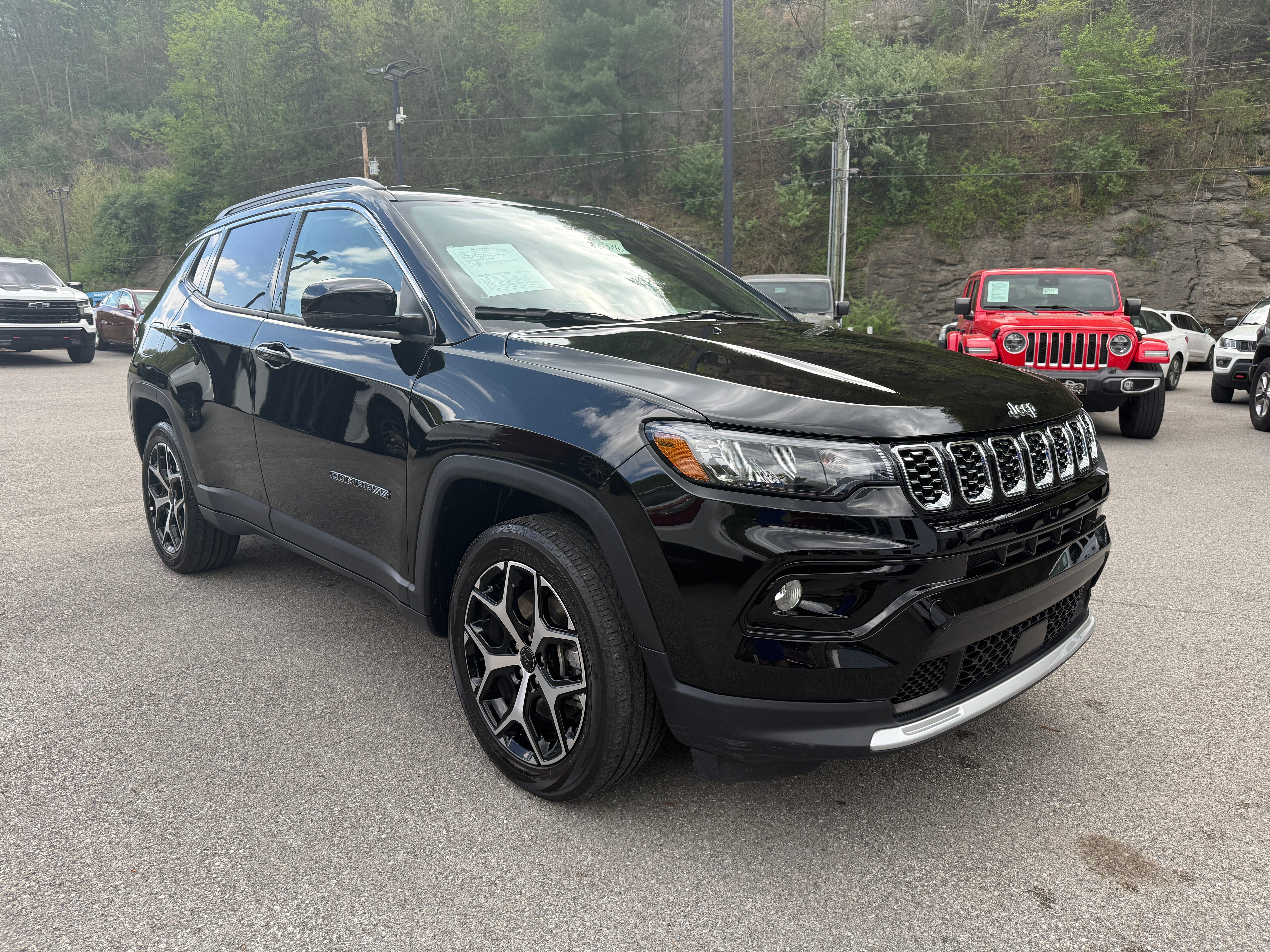 2025 Jeep Compass Limited in Black — front three-quarter view