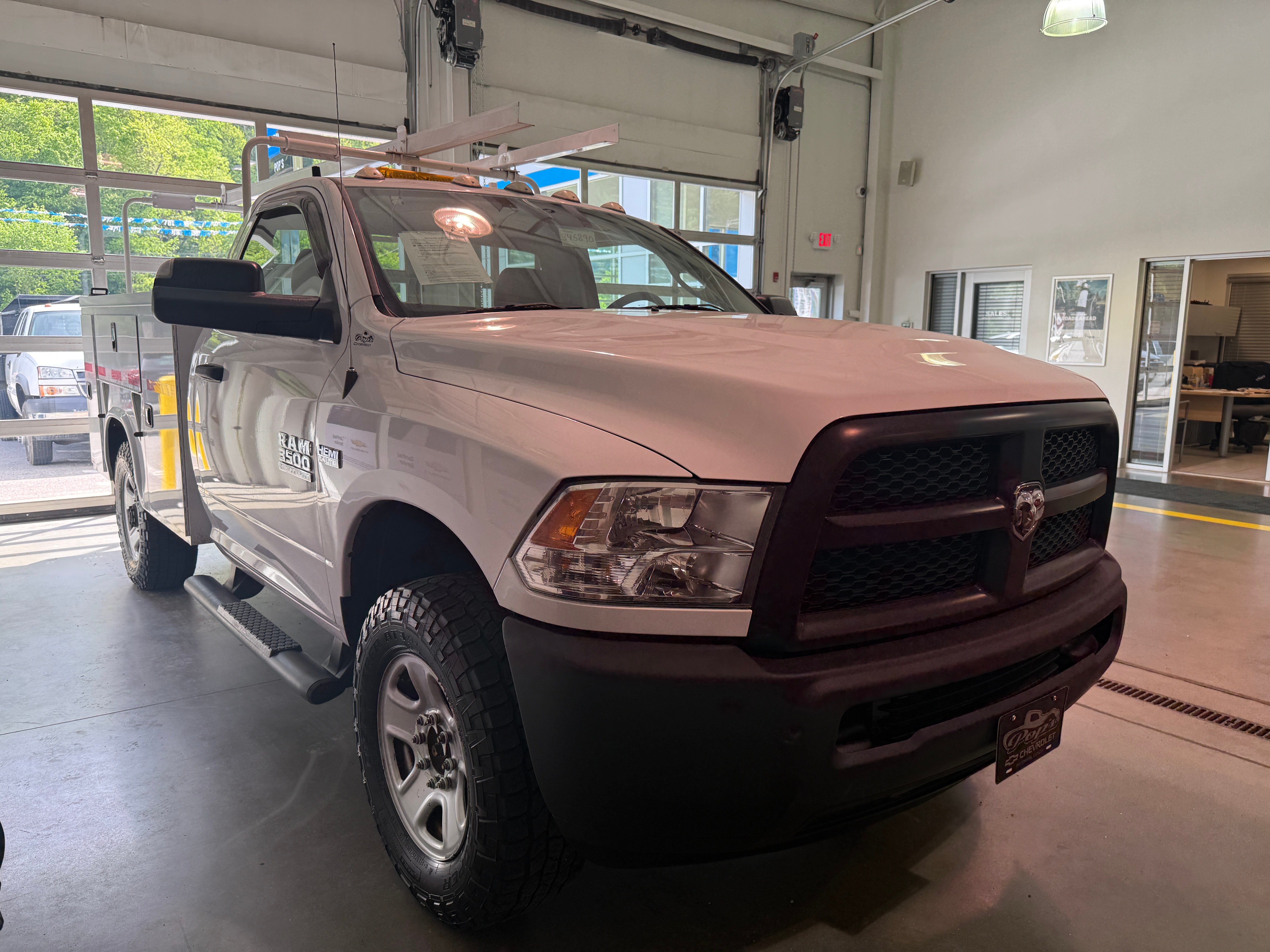 2016 RAM 3500 Tradesman in White — front three-quarter view
