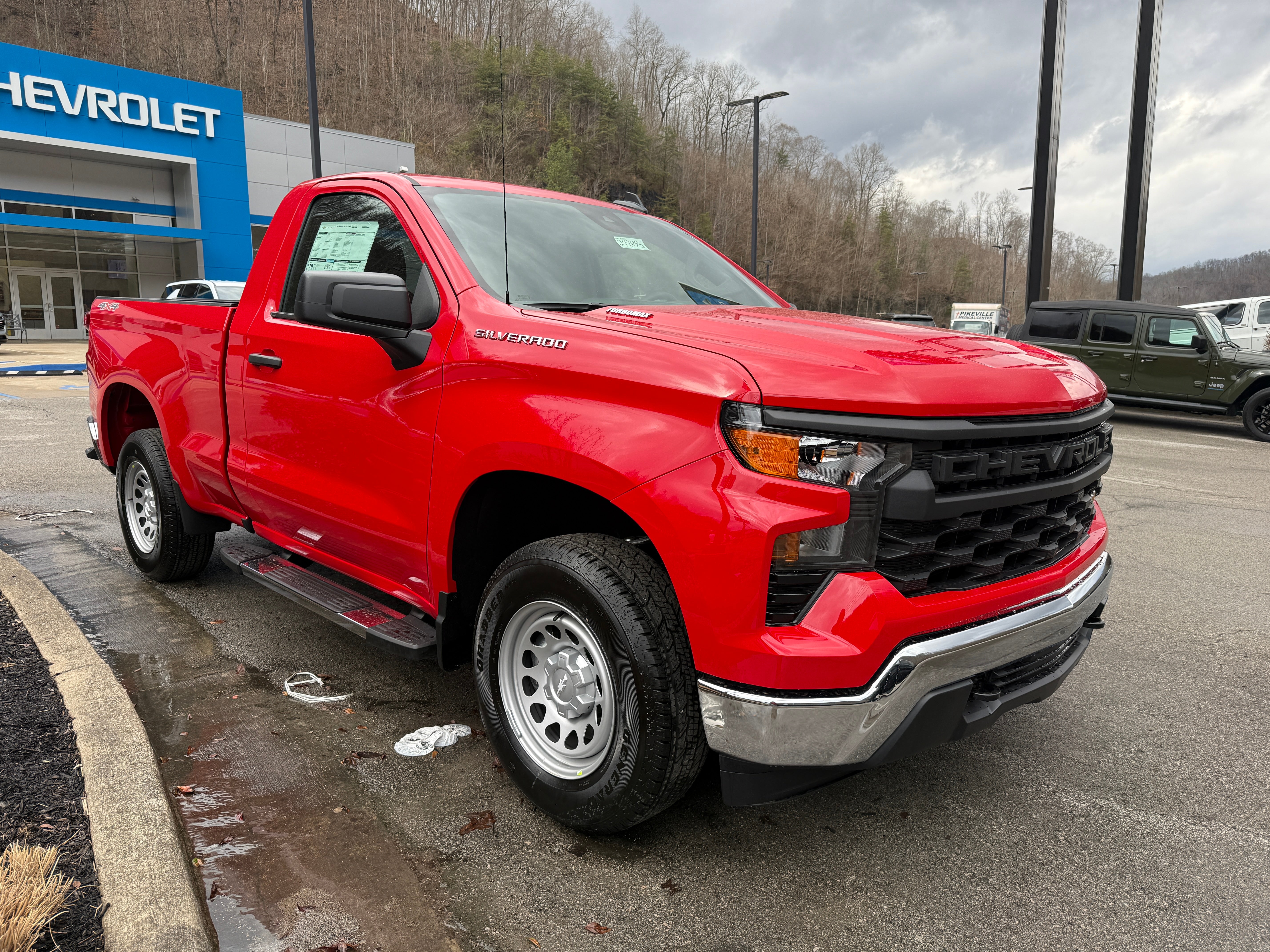 2026 Chevrolet Silverado 1500 WT in Red Hot — front three-quarter view