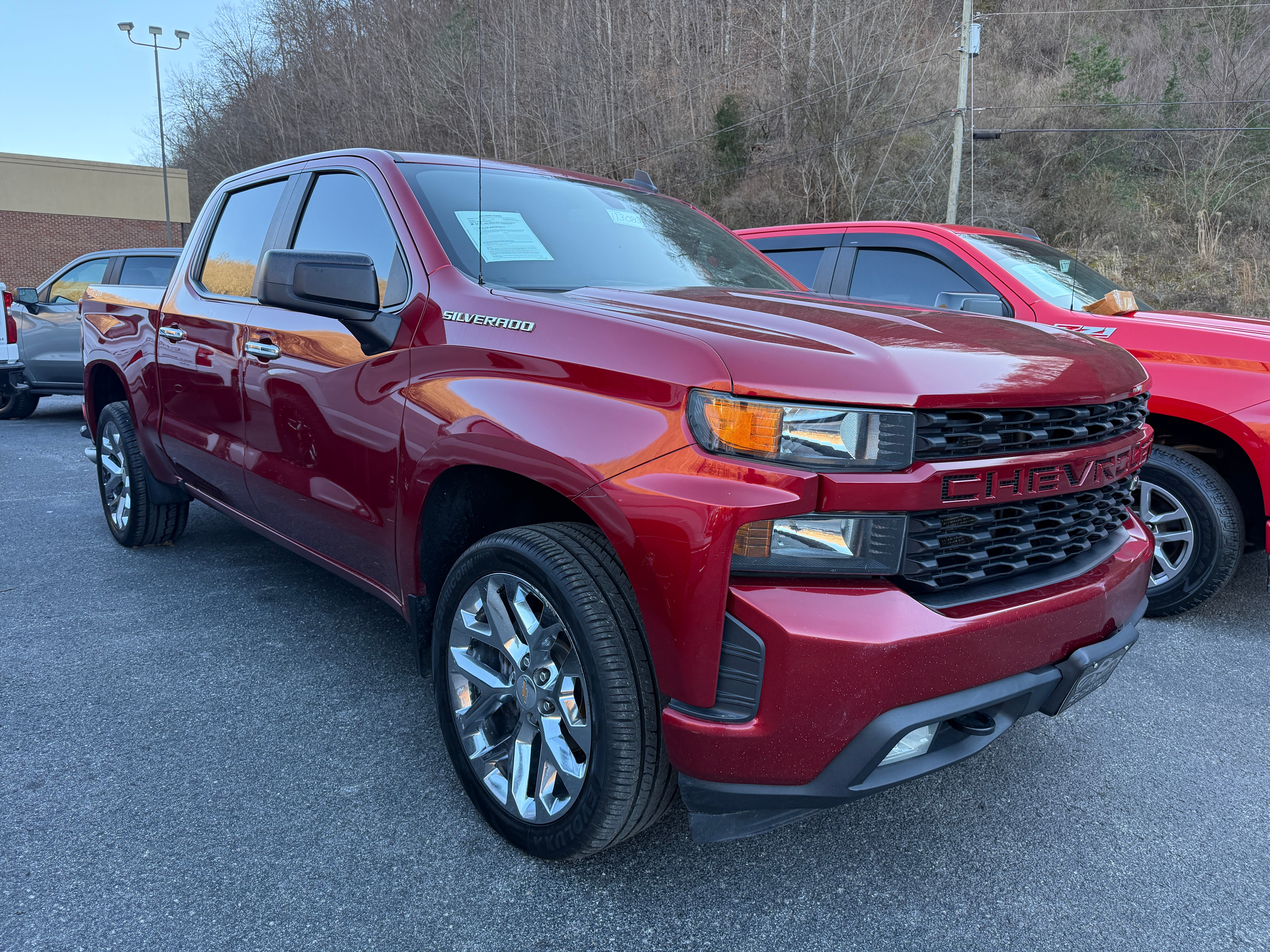 2021 Chevrolet Silverado 1500 Custom in Cherry Red Tintcoat — front three-quarter view