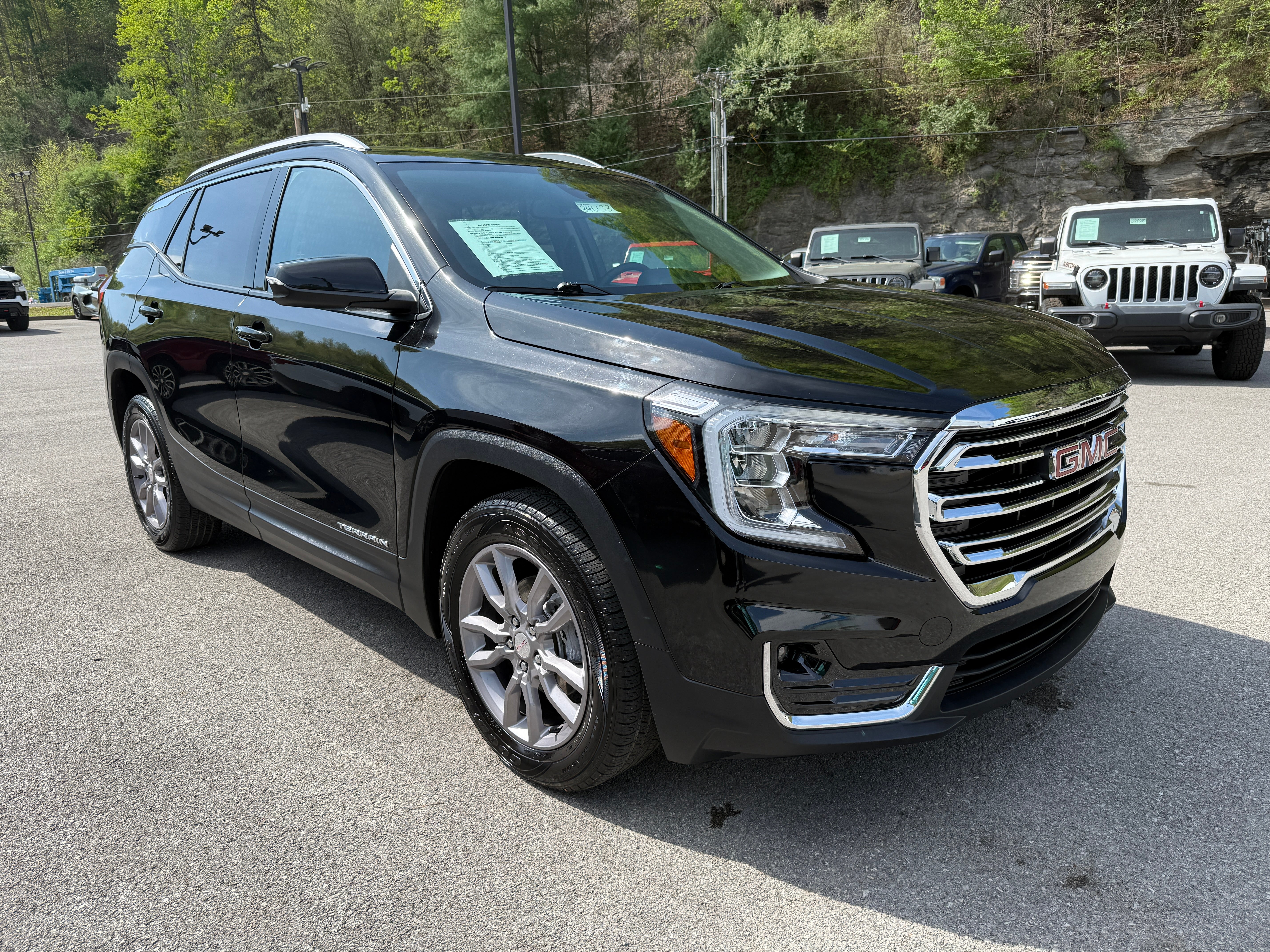 2024 GMC Terrain SLT in Ebony Twilight Metallic — front three-quarter view