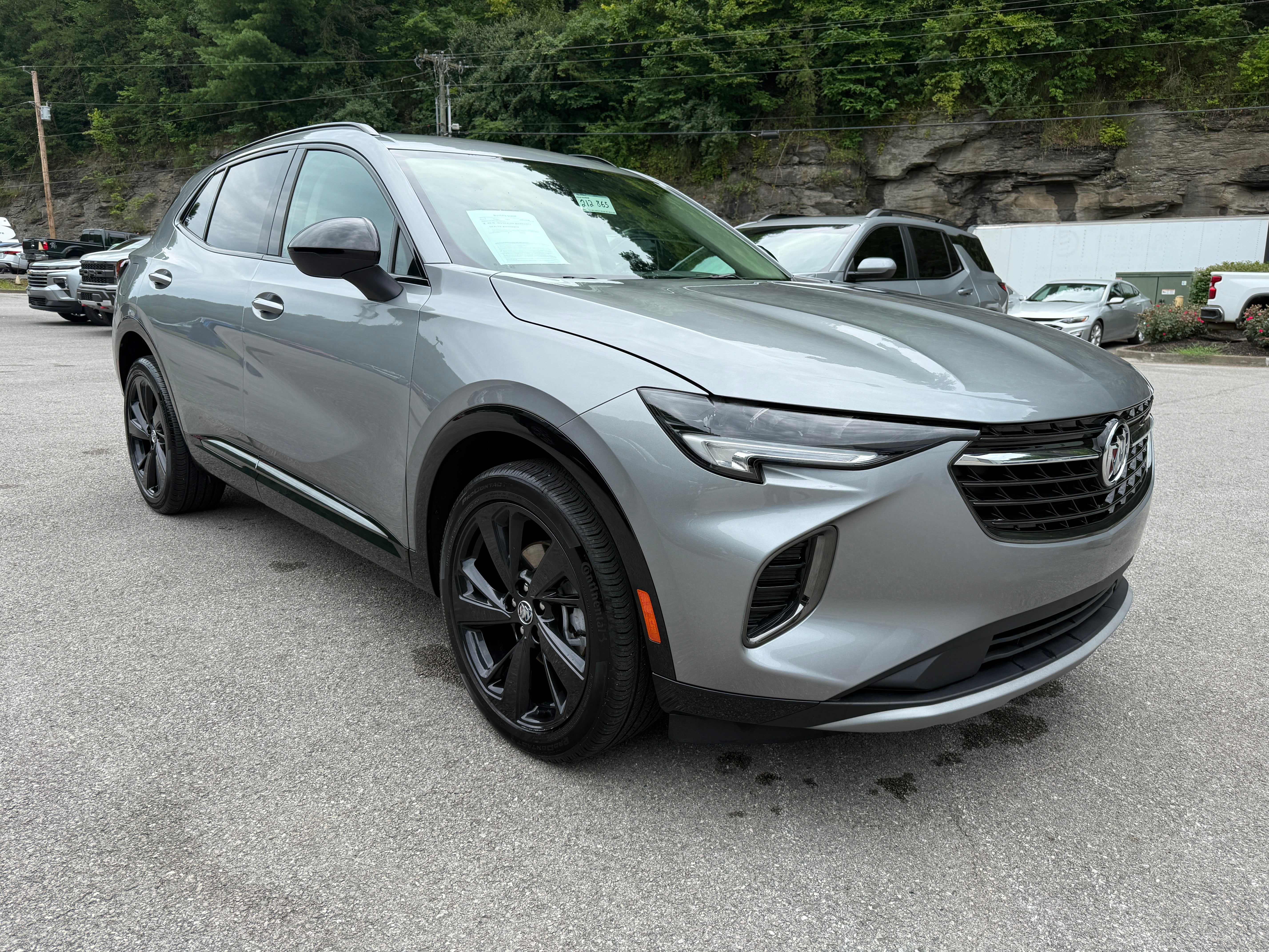 2023 Buick Envision Preferred in Moonstone Gray Metallic — front three-quarter view